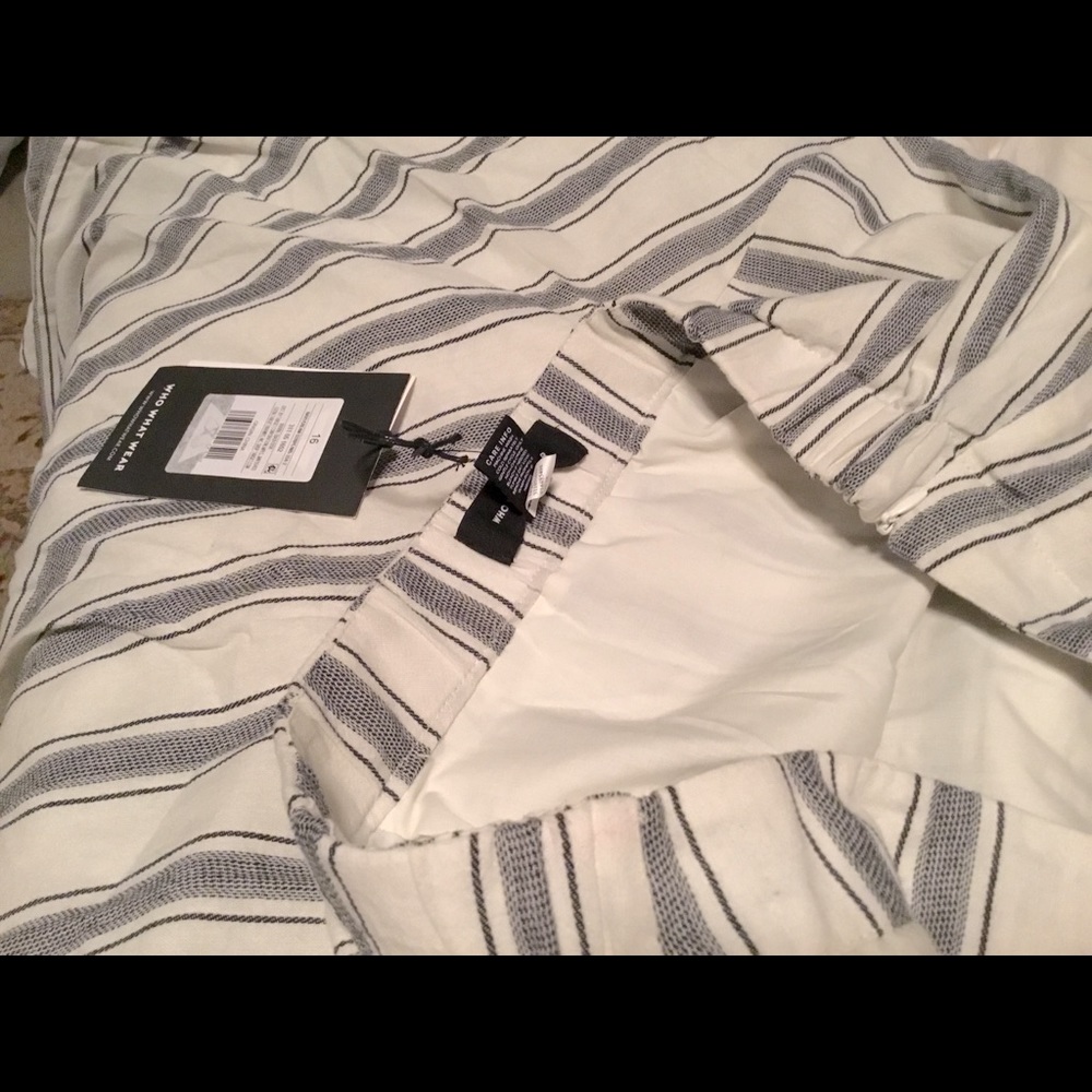 Who What Wear size 16 navy cream stripe skirt with a uniquely cut hem.